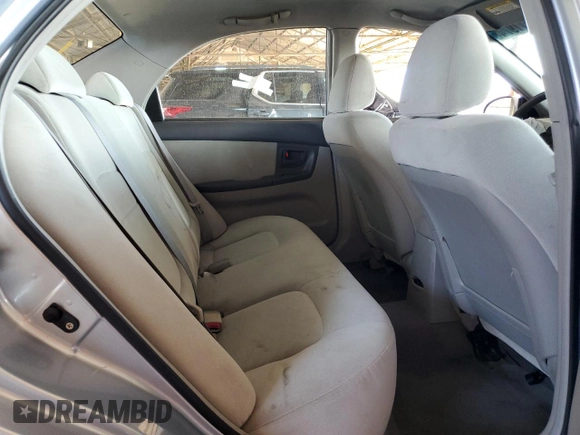2006 Kia Spectra EX with VIN KNAFE121465332510, listed as a Copart auction lot 77211974 with 148,964 mi miles and Salvage Title. Bid and sale history available at carsss.com. Image 10.