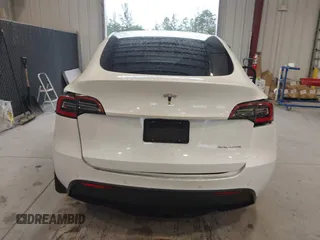 2020 Tesla Model Y Long Range z VIN 5YJYGDEE8LF054338, wystawiony jako IAAI lot #39026888 z przebiegiem 86 142 mil mil oraz . Historia ofert i sprzedaży dostępna na DreamBid. Obrazek 15.