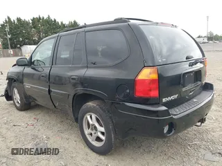 2004 GMC Envoy SLT z VIN 1GKDT13S142113238, wystawiony jako IAAI lot #42232827 z przebiegiem 185 136 mil mil oraz . Historia ofert i sprzedaży dostępna na DreamBid. Obrazek 3.