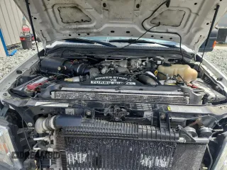 2009 Ford F-250 XL с VIN 1FTSW21R59EA10829, выставлен на аукционе Copart как лот 63988785 с пробегом 120 558 миль миль и Чистый • Clean title. История ставок и продаж доступна на DreamBid. Изображение 11.