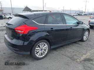 2017 Ford Focus Titanium with VIN 1FADP3N2XHL230766, listed as a IAAI auction lot 42386275 with 64,138 mi miles and . Bid and sale history available at DreamBid. Image 4.