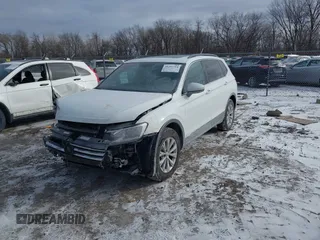 2019 Volkswagen Tiguan SE with VIN 3VV3B7AX7KM040136, listed as a IAAI auction lot 41397714 with 82,302 mi miles and . Bid and sale history available at DreamBid. Image 18.