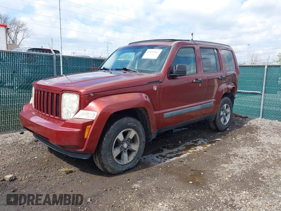 2008 Jeep Liberty Sport with VIN 1J8GN28K68W111462, listed as a IAAI auction lot 42012567 with 129,077 mi miles. Bid and sale history available at carsss.com. Image 18.