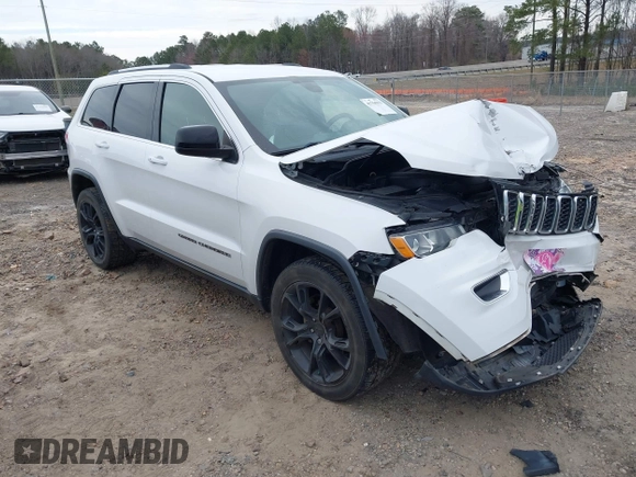 2018 Jeep Grand Cherokee Laredo E with VIN 1C4RJEAG7JC322888, listed as a IAAI auction lot 41756833 with 129,988 mi miles and . Bid and sale history available at DreamBid. Image 1.