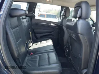 2013 Jeep Grand Cherokee Laredo with VIN 1C4RJEAG9DC621061, listed as a IAAI auction lot 41846537 with 107,264 mi miles. Bid and sale history available at carsss.com. Image 8.