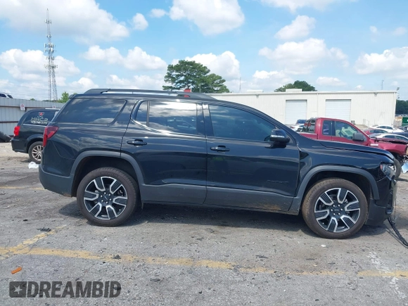 2021 GMC Acadia SLT with VIN 1GKKNMLS0MZ136228, listed as a IAAI auction lot 42445381 with 65,700 mi miles and . Bid and sale history available at DreamBid. Image 13.