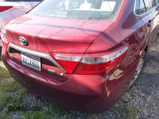 2015 Toyota Camry LE z VIN 4T1BD1FK2FU175195, wystawiony jako IAAI lot #41824458 z przebiegiem 118 490 mil mil oraz . Historia ofert i sprzedaży dostępna na DreamBid. Obrazek 16.