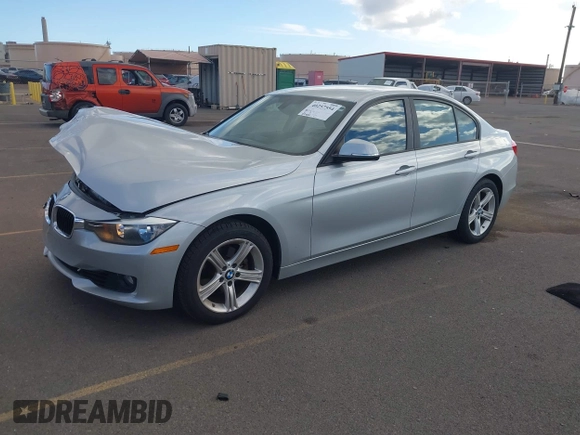2012 BMW 3 Series 328i with VIN WBA3A5G52CNN65587, listed as a IAAI auction lot 40257554 with 89,445 mi miles and . Bid and sale history available at DreamBid. Image 2.