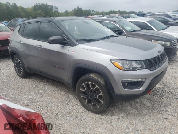 2020 Jeep Compass Trailhawk with VIN 3C4NJDDB6LT195731, listed as a Copart auction lot 50948035 with 80,195 mi miles and Salvage title. Bid and sale history available at DreamBid. Image 4.