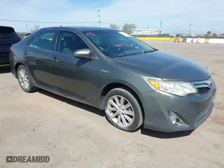 2012 Toyota Camry Hybrid XLE with VIN 4T1BD1FK0CU020723, listed as a IAAI auction lot 42031093 with 121,297 mi miles. Bid and sale history available at carsss.com. Image 1.