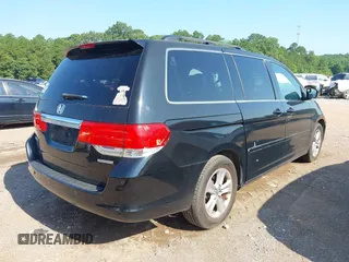2010 Honda Odyssey Touring with VIN 5FNRL3H97AB104359, listed as a IAAI auction lot 42555872 with 233,952 mi miles and . Bid and sale history available at DreamBid. Image 4.
