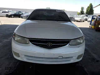1999 Toyota Solara SE z VIN 2T1CF22P4XC171139, wystawiony jako Copart lot #58728195 z przebiegiem 148 703 mil mil oraz Szkody całkowita. Historia ofert i sprzedaży dostępna na DreamBid. Obrazek 5.