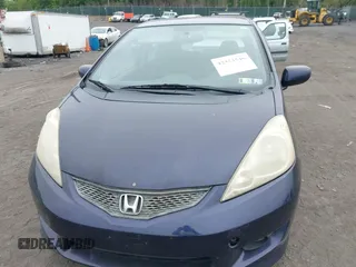 2009 Honda Fit Sport z VIN JHMGE87679S043551, wystawiony jako IAAI lot #42353546 z przebiegiem 156 143 mil mil oraz . Historia ofert i sprzedaży dostępna na DreamBid. Obrazek 6.