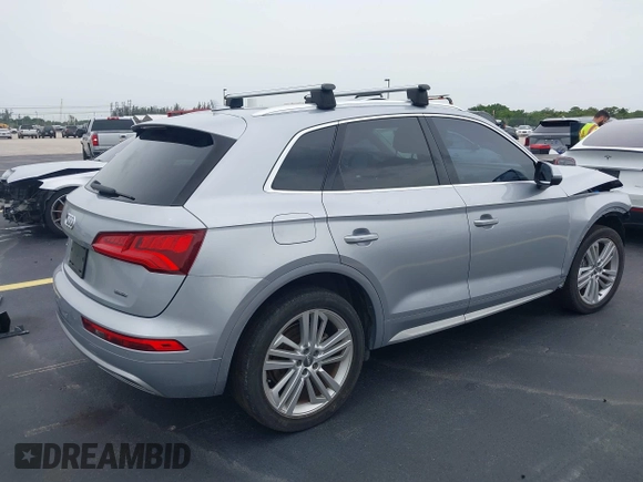 2019 Audi Q5 Premium Plus z VIN WA1BNAFY5K2084220, wystawiony jako IAAI lot #42391537 z przebiegiem 36 143 mil mil oraz . Historia ofert i sprzedaży dostępna na DreamBid. Obrazek 4.