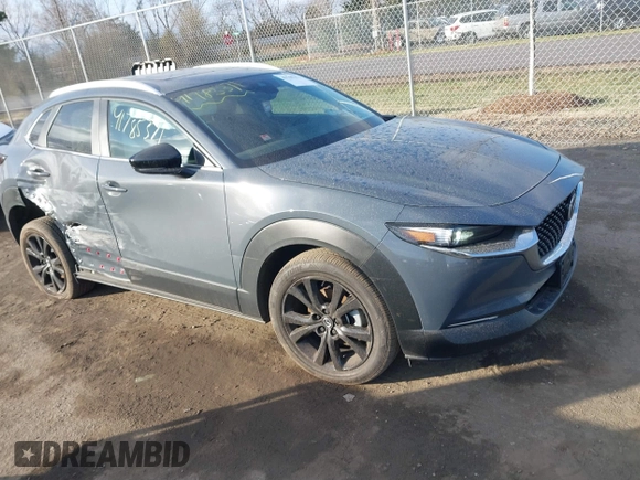 2023 Mazda CX-30 S Carbon Edition with VIN 3MVDMBCM1PM573317, listed as a IAAI auction lot 41785371 with 6,475 mi miles and . Bid and sale history available at DreamBid. Image 1.