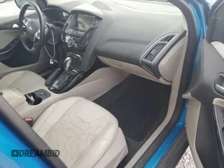 2014 Ford Focus Electric z VIN 1FADP3R41EL341620, wystawiony jako Copart lot #87277454 z przebiegiem 67 589 mil mil oraz Szkody całkowita. Historia ofert i sprzedaży dostępna na DreamBid. Obrazek 8.