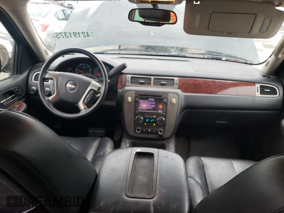 2009 GMC Yukon SLT w/4SB with VIN 1GKFK33099R228562, listed as a Copart auction lot 42191375 with 133,568 mi miles and Salvage Title. Bid and sale history available at carsss.com. Image 8.