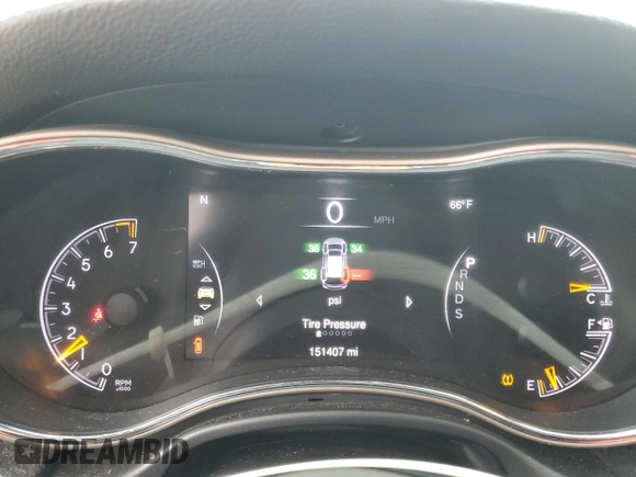 2014 Jeep Grand Cherokee Laredo with VIN 1C4RJEAGXEC130094, listed as a Copart auction lot 55997925 with 151,407 mi miles and Salvage Title. Bid and sale history available at DreamBid. Image 9.