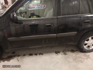 2005 Chevrolet TrailBlazer LT with VIN 1GNDT13S152249874, listed as a IAAI auction lot 42071247 with 165,616 mi miles. Bid and sale history available at carsss.com. Image 6.