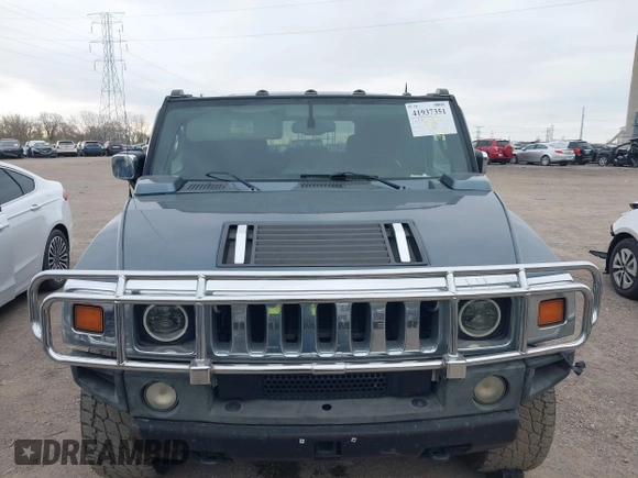 2005 Hummer H2 SUV z VIN 5GRGN23U95H100888, wystawiony jako IAAI lot #41937351 z przebiegiem 202 969 mil mil oraz . Historia ofert i sprzedaży dostępna na DreamBid. Obrazek 6.