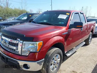 2014 Ford F-150 XL with VIN 1FTFX1EF4EKD24122, listed as a IAAI auction lot 42089031 with 169,136 mi miles and . Bid and sale history available at carsss.com. Image 2.