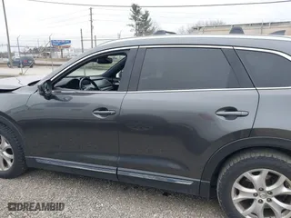 2016 Mazda CX-9 Grand Touring with VIN JM3TCBDY1G0103560, listed as a IAAI auction lot 41344813 with 123,588 mi miles. Bid and sale history available at carsss.com. Image 14.