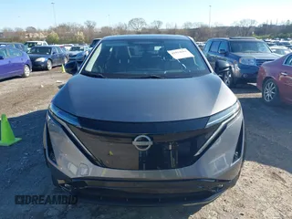 2024 Nissan ARIYA Platinum+ z VIN JN1DF0CD2RM740057, wystawiony jako IAAI lot #41824664 z przebiegiem 1167 mil mil oraz . Historia ofert i sprzedaży dostępna na DreamBid. Obrazek 12.