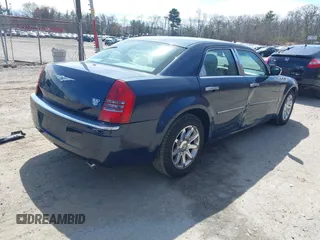 2005 Chrysler 300 C with VIN 2C3JA63HX5H124452, listed as a IAAI auction lot 41877404 with 93,972 mi miles and . Bid and sale history available at DreamBid. Image 4.