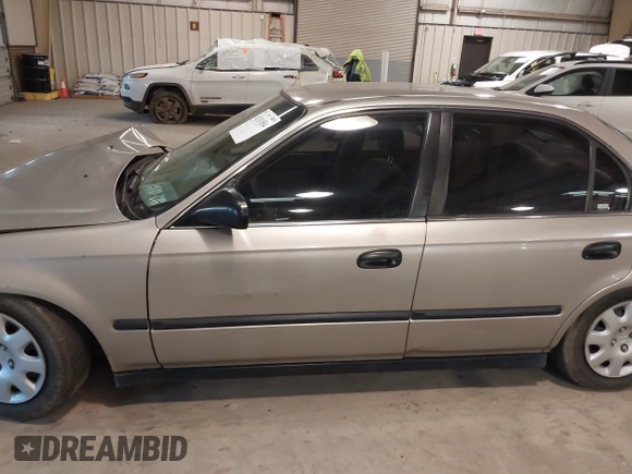 2000 Honda Civic LX with VIN 1HGEJ6578YL042505, listed as a IAAI auction lot 41331854 with 226,727 mi miles. Bid and sale history available at carsss.com. Image 14.