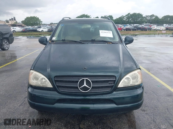 2000 Mercedes-Benz M 320/430/500 with VIN 4JGAB54E0YA218894, listed as a IAAI auction lot 41985116 with 120,889 mi miles and . Bid and sale history available at DreamBid. Image 6.