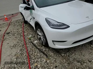 2021 Tesla Model Y Long Range with VIN 5YJYGDEE0MF265423, listed as a Copart auction lot 50298545 with Not Provided miles and Non Repairable. Bid and sale history available at DreamBid. Image 14.
