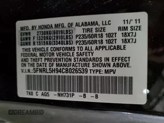 2012 Honda Odyssey Touring with VIN 5FNRL5H94CB026539, listed as a Copart auction lot 48925605 with 88,381 mi miles and Salvage Title. Bid and sale history available at DreamBid. Image 14.