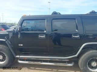 2005 Hummer H2 SUV with VIN 5GRGN23U05H128420, listed as a IAAI auction lot 41983395 with 194,925 mi miles. Bid and sale history available at carsss.com. Image 15.