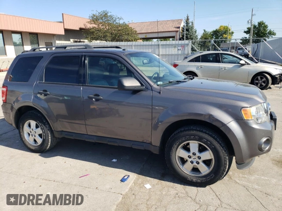 2012 Ford Escape XLT с VIN 1FMCU9DGXCKB64552, выставлен на аукционе Copart как лот 67058514 с пробегом 106 523 миль миль и На запчасти • Non repairable. История ставок и продаж доступна на DreamBid. Изображение 4.