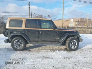2020 Jeep Wrangler Unlimited Sahara with VIN 1C4HJXEN6LW113725, listed as a IAAI auction lot 41399766 with 87,583 mi miles. Bid and sale history available at carsss.com. Image 14.