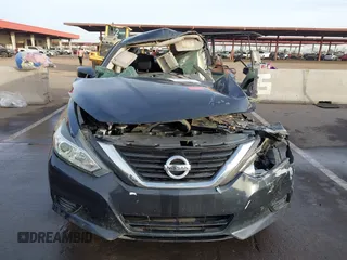 2016 Nissan Altima S with VIN 1N4AL3AP9GN380841, listed as a IAAI auction lot 41033422 with Not Provided miles and . Bid and sale history available at DreamBid. Image 11.