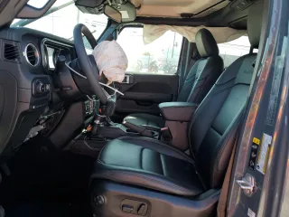 2024 Jeep Wrangler Sahara z VIN 1C4RJXP62RW228549, wystawiony jako Copart lot #57480235 z przebiegiem 6 036 mil mil oraz Szkoda całkowita • Salvage title. Historia ofert i sprzedaży dostępna na DreamBid. Obrazek 7.