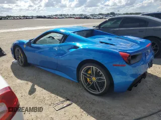 2018 Ferrari 488 z VIN ZFF80AMA9J0231686, wystawiony jako Copart lot #77623854 z przebiegiem Nie podano mil oraz Szkody całkowita. Historia ofert i sprzedaży dostępna na DreamBid. Obrazek 2.