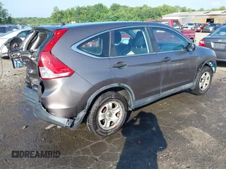 2013 Honda CR-V LX with VIN 3CZRM3H31DG703436, listed as a IAAI auction lot 42702584 with 140,013 mi miles and . Bid and sale history available at DreamBid. Image 4.