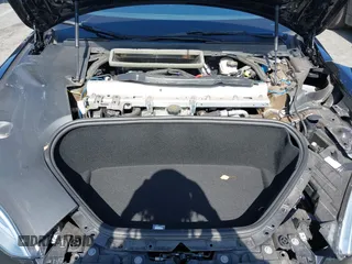 2022 Tesla Model S with VIN 5YJSA1E5XNF467435, listed as a IAAI auction lot 42538706 with 26,504 mi miles and . Bid and sale history available at DreamBid. Image 10.