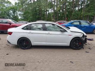 2022 Volkswagen Jetta GLI Autobahn with VIN 3VW2T7BU1NM028092, listed as a IAAI auction lot 42430756 with 20,666 mi miles and . Bid and sale history available at DreamBid. Image 14.