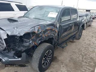 2022 Toyota Tacoma SR5 with VIN 3TMAZ5CN6NM186713, listed as a IAAI auction lot 42607719 with 60,704 mi miles and . Bid and sale history available at DreamBid. Image 6.