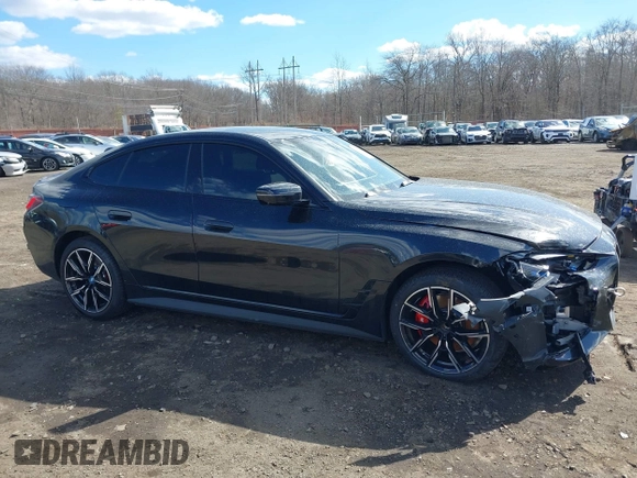 2024 BMW i4 xDrive40 z VIN WBY83FB04RFT19615, wystawiony jako IAAI lot #41679918 z przebiegiem 3 883 mil mil oraz . Historia ofert i sprzedaży dostępna na DreamBid. Obrazek 13.