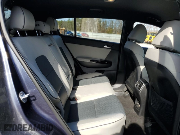 2019 Kia Sportage EX z VIN KNDPNCAC9K7533792, wystawiony jako Copart lot #53251705 z przebiegiem 36 885 mil mil oraz Szkoda całkowita • Salvage title. Historia ofert i sprzedaży dostępna na DreamBid. Obrazek 11.