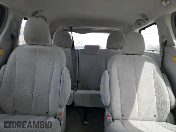 2012 Toyota Sienna LE with VIN 5TDJK3DC8CS047122, listed as a Copart auction lot 52036115 with 76,869 mi miles and Salvage Title. Bid and sale history available at carsss.com. Image 10.