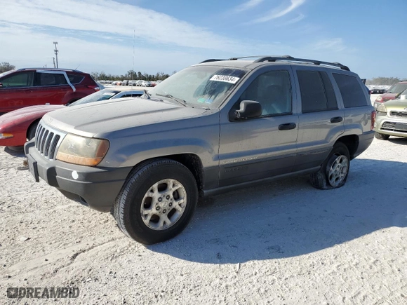 2001 Jeep Grand Cherokee Laredo with VIN 1J4GW48N01C682814, listed as a Copart auction lot 76239634 with 0 mi miles and Salvage Title. Bid and sale history available at carsss.com. Image 1.