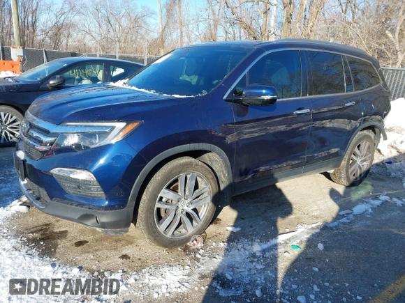 2017 Honda Pilot Touring with VIN 5FNYF6H99HB105446, listed as a IAAI auction lot 41283368 with 91,452 mi miles and . Bid and sale history available at DreamBid. Image 20.