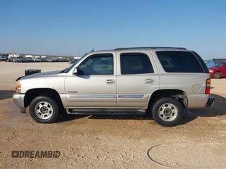 2005 GMC Yukon SLT with VIN 1GKEK13T95R203827, listed as a IAAI auction lot 41815086 with 136,671 mi miles. Bid and sale history available at carsss.com. Image 14.