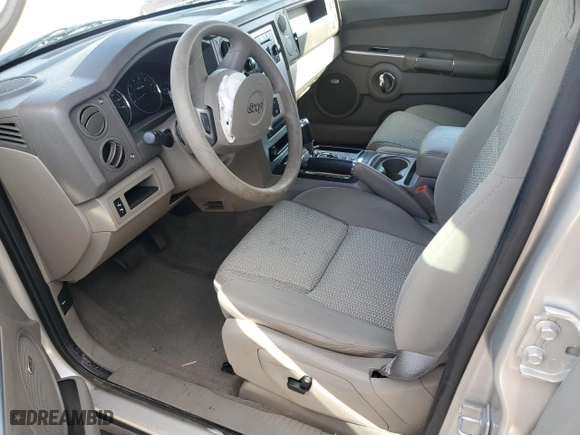 2009 Jeep Commander Sport with VIN 1J8HH48K59C514861, listed as a Copart auction lot 44076015 with 129,674 mi miles and Salvage Title. Bid and sale history available at carsss.com. Image 7.