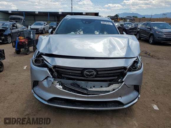 2016 Mazda CX-9 Grand Touring с VIN JM3TCADY2G0121026, выставлен на аукционе Copart как лот 60518105 с пробегом 104 923 миль миль и Списание • Salvage title. История ставок и продаж доступна на DreamBid. Изображение 5.